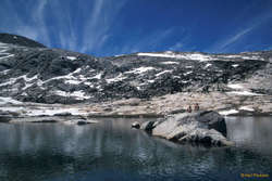 Sam and Karl sitting on a rock in Steelhead Lake