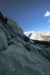 Scott and some guys at the base of Guppie Wall, Pywiak Dome behind