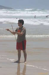 Paul helps attempt to fly Damo's kite