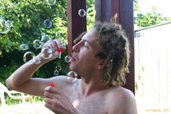 Damo blows bubbles