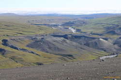 The dam is expected to reach to the toe of the glacier in the distance