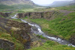 Looking back down the valley, you can see the caves the track goes through