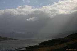 Blue skies over grey sunbeams in Þorskafjörður