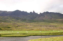 Hraundrangi not so shrouded in clouds
