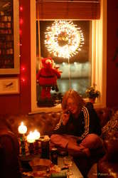 Stína chats with family after dinner