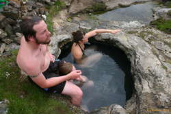 Jared, Nerida and Kate enjoy the warmth and the view