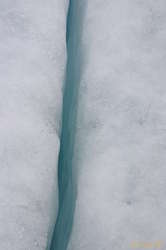 Beautiful clean blue crack in the ice