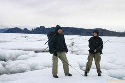Kids playing with swords on a glacier. Súla in the background