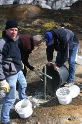 Guido, Helgi and Wolfgang pouring concrete