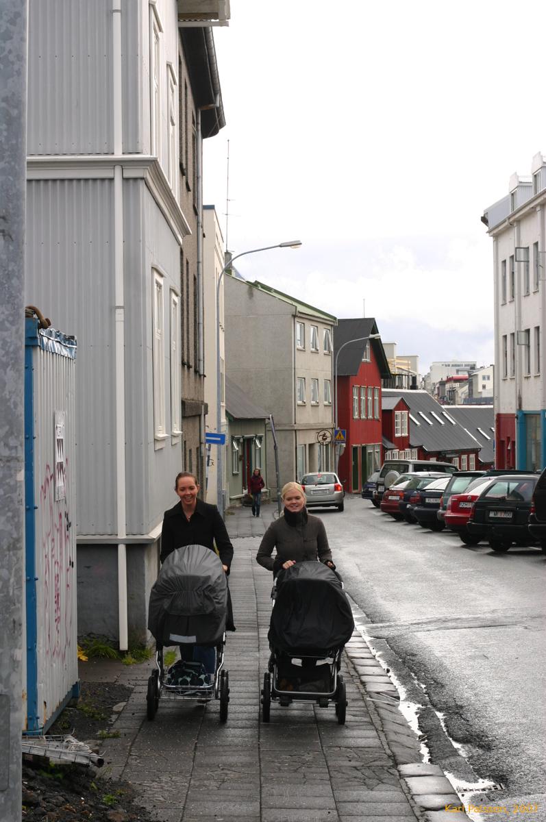 Girls out for a walk with their babies