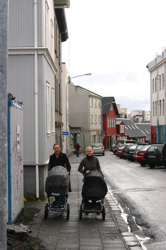 Girls out for a walk with their babies