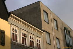 Old and hand made meets new concrete and glass