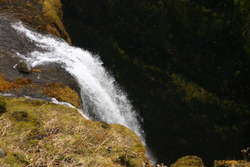 Water spilling into the void