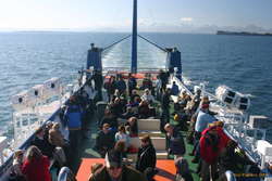 Passengers lounging on the top deck