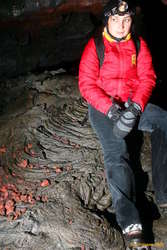 Julia sitting on some ropey lava