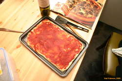 Pizza construction. (note rolling pin)