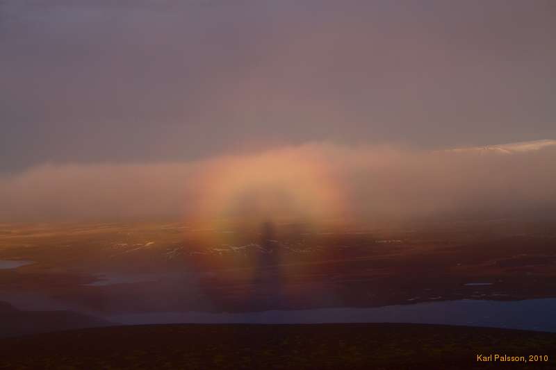 Anti-solar halos around my shadow.  Ok in the back right