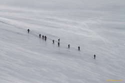 One group dropping down into the saddle