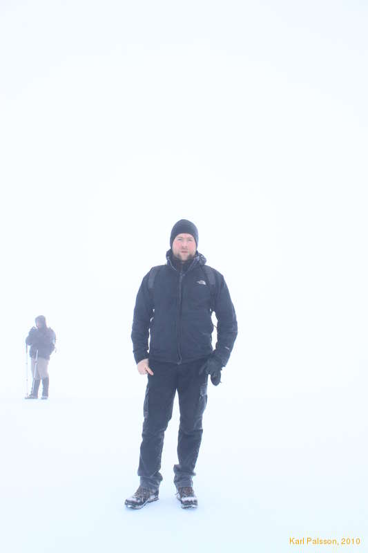 Logi on top of something, somewhere