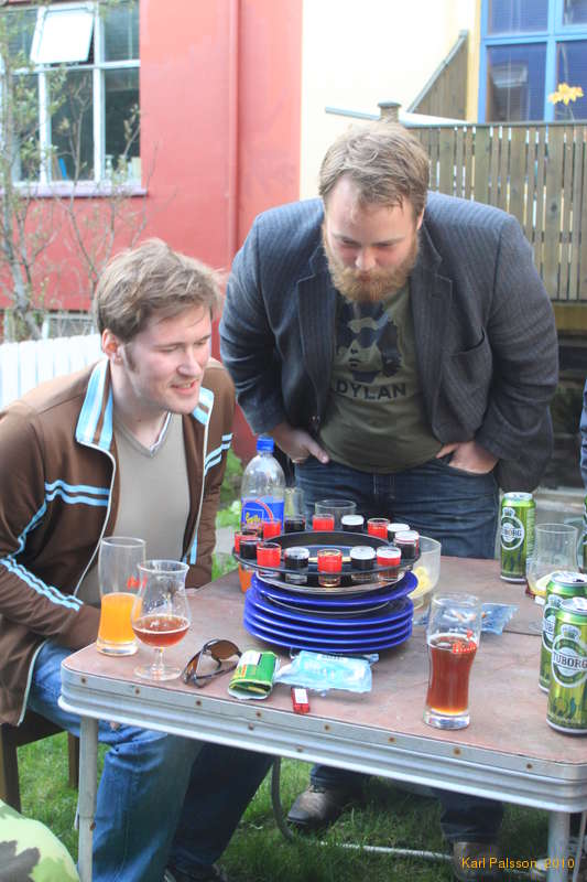 Eggert and Jón Torfi consulting the wheel of fortune