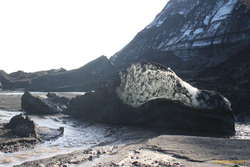 Sunlit ice at the glacier's toe
