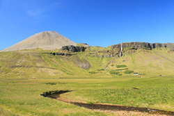 Green and barren at the same time, Mælifell and Barnafoss