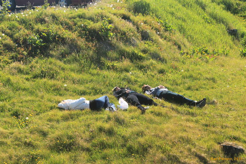 Tourists relaxing in the sun