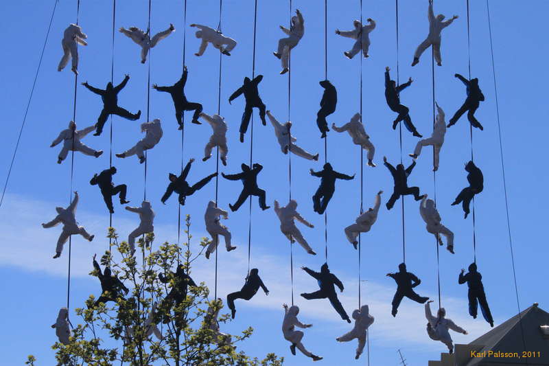 People hanging from the sky