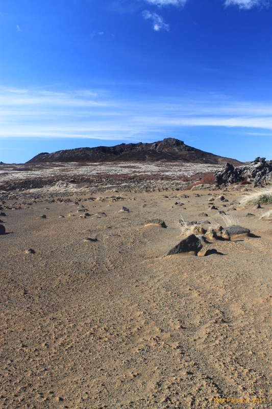 Dirtbike tracks in sand towards Búrfell
