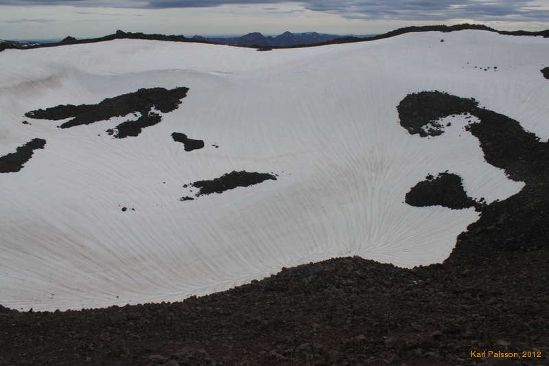 Down the drain hole, inside the crater