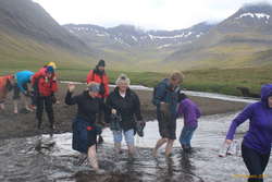 Bára and Bjöggi wading