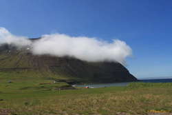 Fluffy clouds at Skálavík
