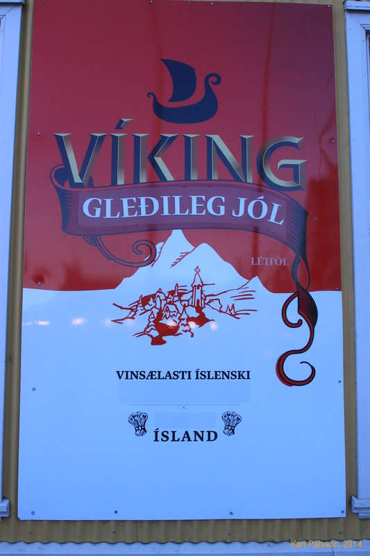 With blanks over certain words, because advertising beer is illegal, but this giant banner for 