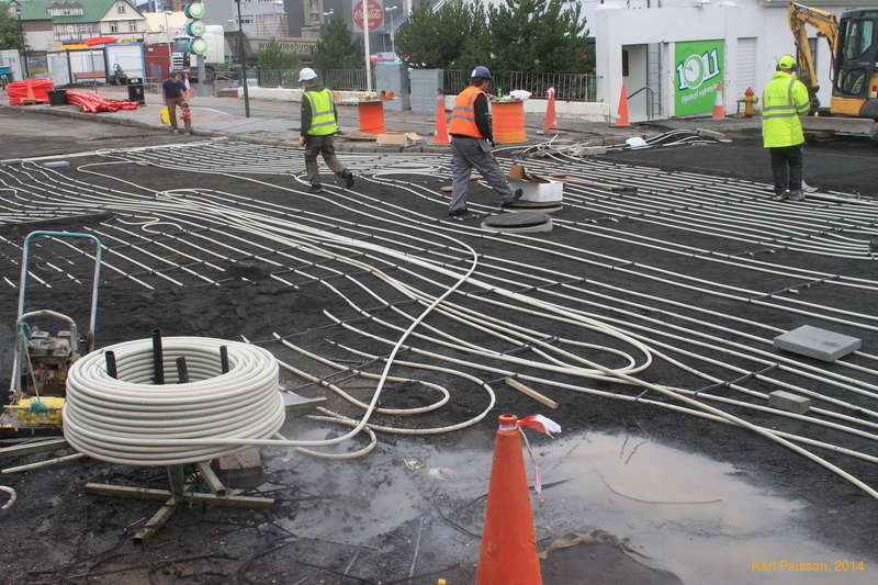 Laying ice melting gear under the street