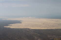 North East to where the lava's meeting the river