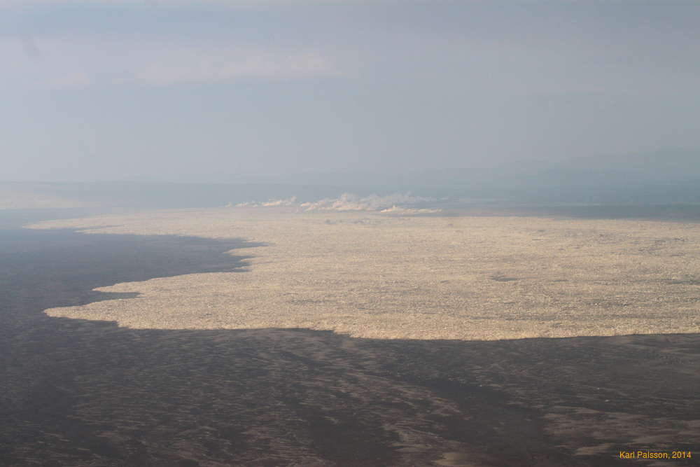 North East to where the lava's meeting the river