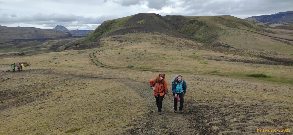 Kata and Ásta walking up, Hattfell in distance